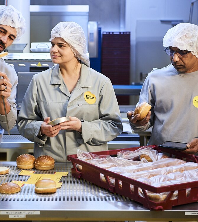 three Fortisa employees in the bakery 