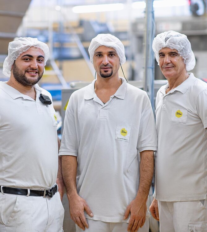 three Fortisa employees in the bakery 